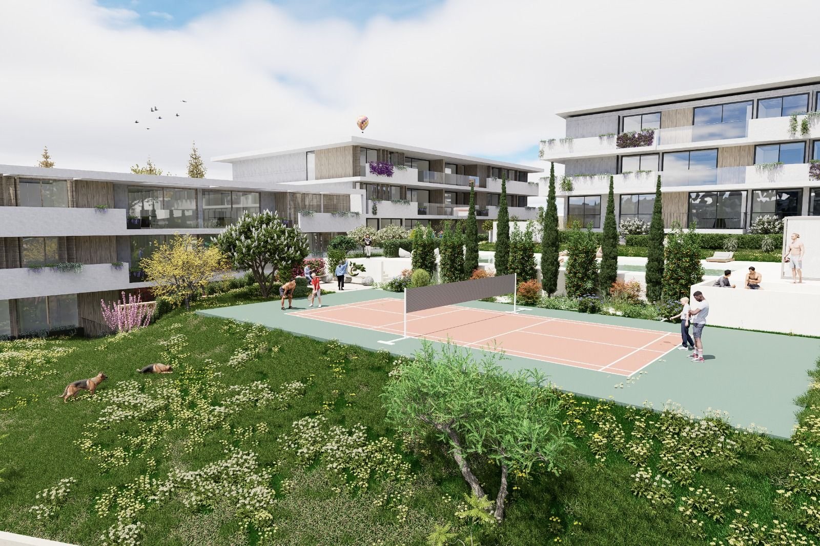 Campo de padel entre os edifícios e os jardins